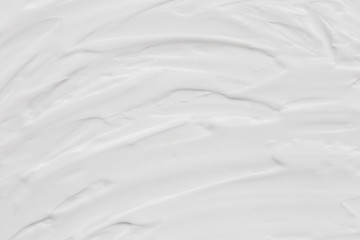 Cosmetics. Cream white background texture.