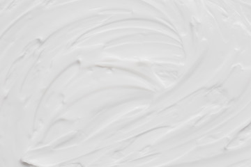 Cosmetics. Cream white background texture.