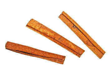 Cinnamon sticks on white background, top view