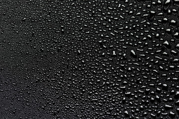 water drops on black background.