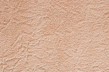 Rough abstract scratched beige-brown wall texture