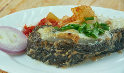 Boiled catfish, Romanian style.
