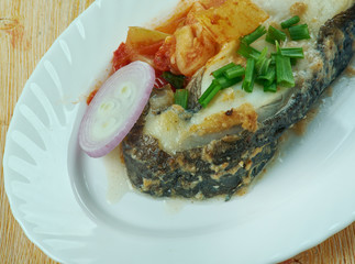 Boiled catfish, Romanian style.
