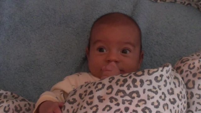 &ldquo;Good morning, sonny&rdquo; Small child wakes up in big bed in the morning