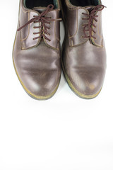 pair  brown leather shoes isolated on white background , classic male shoe on white background ,close up shoes
