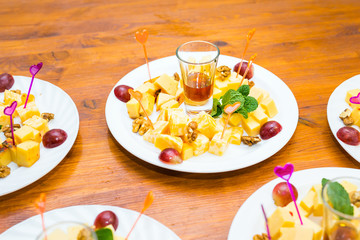 Cubes of yellow cheese