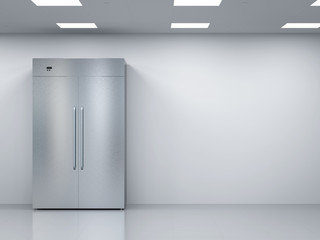 fridge with side by side doors in empty room