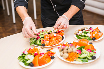 Close-up of chef cooking food kitchen restaurant cutting cook hands hotel man male knife preparation fresh preparing concept
