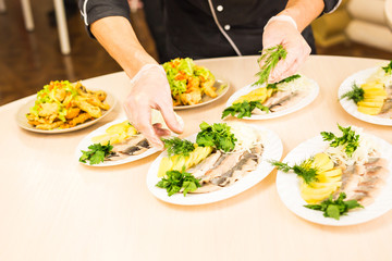 Close-up of chef cooking food kitchen restaurant cutting cook hands hotel man male knife preparation fresh preparing concept