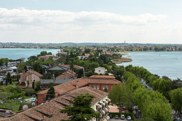 Obraz premium Aerial View of peninsula with Sirmione town from the Scaliger Castle over the Garda Lake, Italy