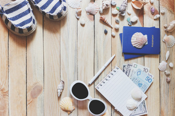 Striped espadrilles, money, passports and marine decorations