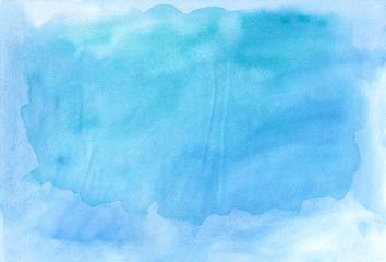 Crumpled paper background with blue watercolor