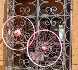 Fototapeta na wymiar bike wheels on a metal grill