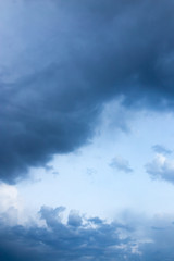 Beautiful clouds at sunset after rain as background .