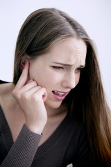 Woman suffering from earache