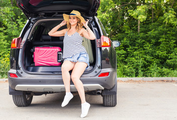 Happy woman on vacation. Summer holiday and car travel concept