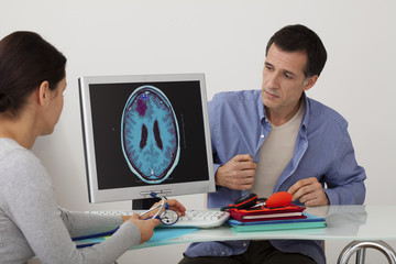 Models On screen, MRI of the brain of an epileptic patient