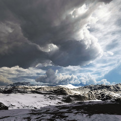 Obraz na płótnie Canvas Snow storm in the mountains. Winter day