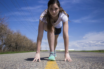 Female getting ready to begin running