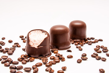 Strawberry souffles in chocolate and coffee beans