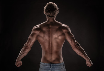 Fototapeta na wymiar Strong Athletic Man Fitness Model