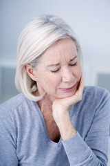 Senior woman with toothache
