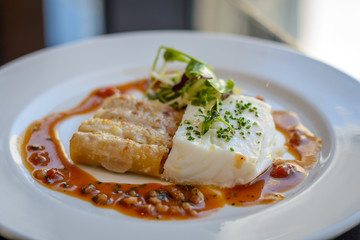 Silver cod, lobster macaroni and  piquillo sauce