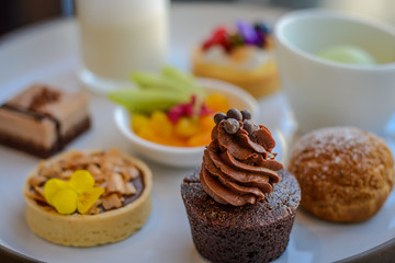 Fototapeta na wymiar Afternoon tea and pastry dessert sweets set