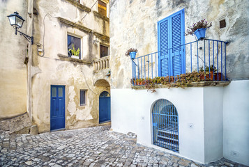 Beautiful mediterranean courtyard in Otranto, Italy - obrazy, fototapety, plakaty