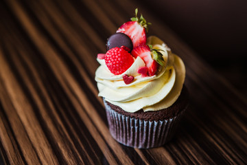 Cupcakes with strawberries and cream