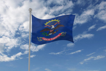 North Dakota flag waving in the sky