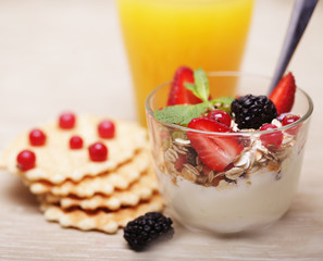 tasty breakfast - granola, coffee, biscuits and orange juice