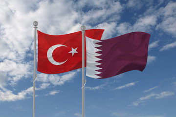 Turkey and Qatar flag waving in the sky