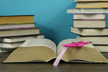 Open book on the against books