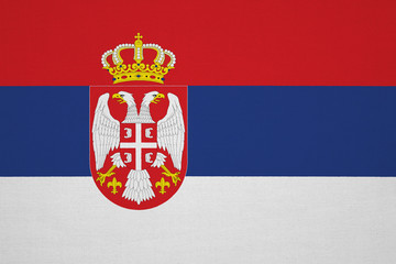 Serbia flag with fabric texture - obrazy, fototapety, plakaty