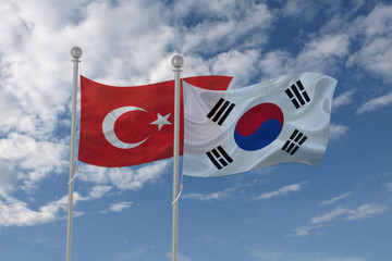 Turkey and South Korea flag waving in the sky