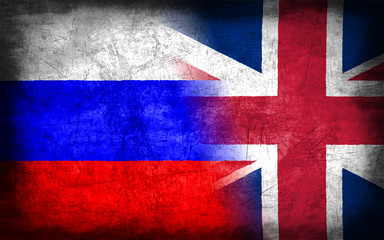 Russia and Great Britain flag with grunge metal texture