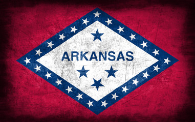 Fototapeta na wymiar Arkansas flag with grunge metal texture