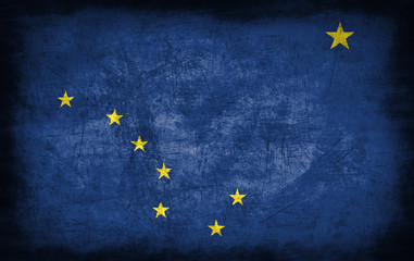 Alaska flag with grunge metal texture