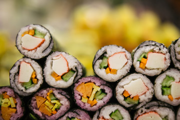 Asian street food. Traditional spring rolls with rice in vietnamese night market