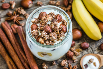 Serving of Yogurt with  Muesli, Banana and Nuts