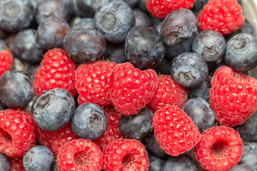 raspberries and blueberries background