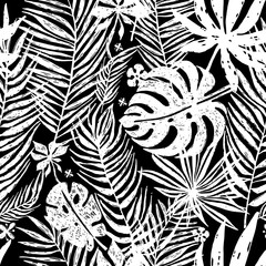 Seamless repeating pattern with white silhouettes of palm tree leaves in black background. Vector botanical illustration, elements for design.