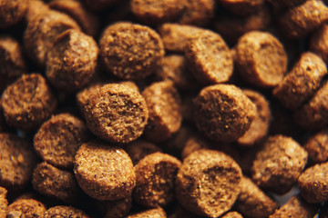 Dried dog and cat food background macro . cat food wallpaper closeup