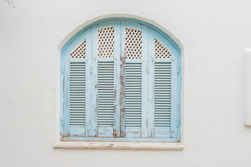 Traditional old painted door in a historical district or medina, Tunisia. Colorful textured image of muslim architecture.