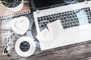 Business workplace with laptop coffee cup and security concept o