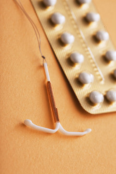 Copper IUD and contraceptive pills