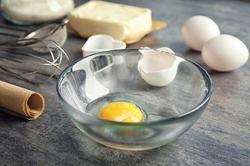 Ingredients for preparing butter cookies on kitchen table