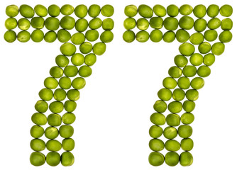 Arabic numeral 77, seventy seven, from green peas, isolated on white background