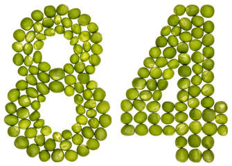 Arabic numeral 84, eighty four, from green peas, isolated on white background